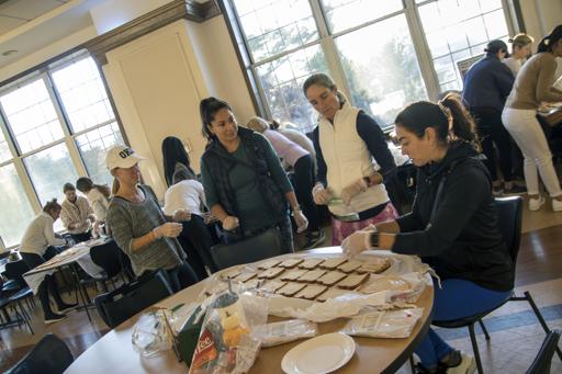 Parents' Association Assembling Sandwiches for Bridges