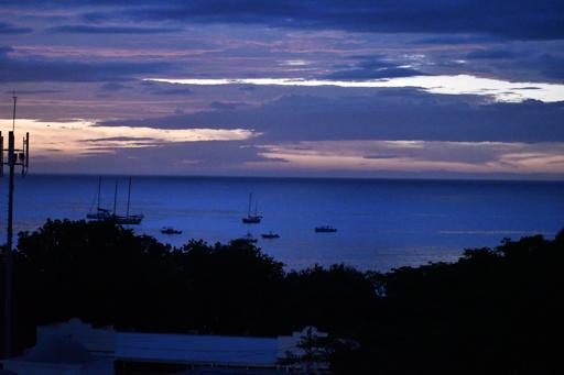 Surfing, dinner at the roof
